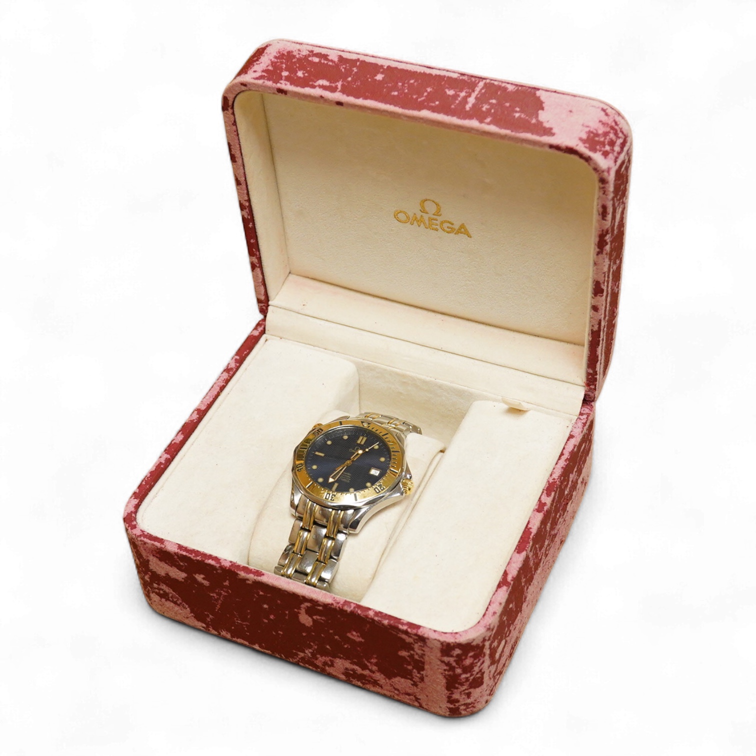 A gentleman's mid 1980's stainless steel and gold plated Omega Seamaster Professional Chronometer automatic wrist watch, with blue dial, dot numerals and date aperture, movement c.1109, case diameter 40mm, on an Omega st